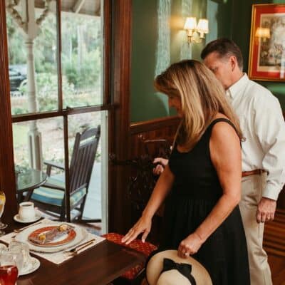 man and women standing near breakfast table