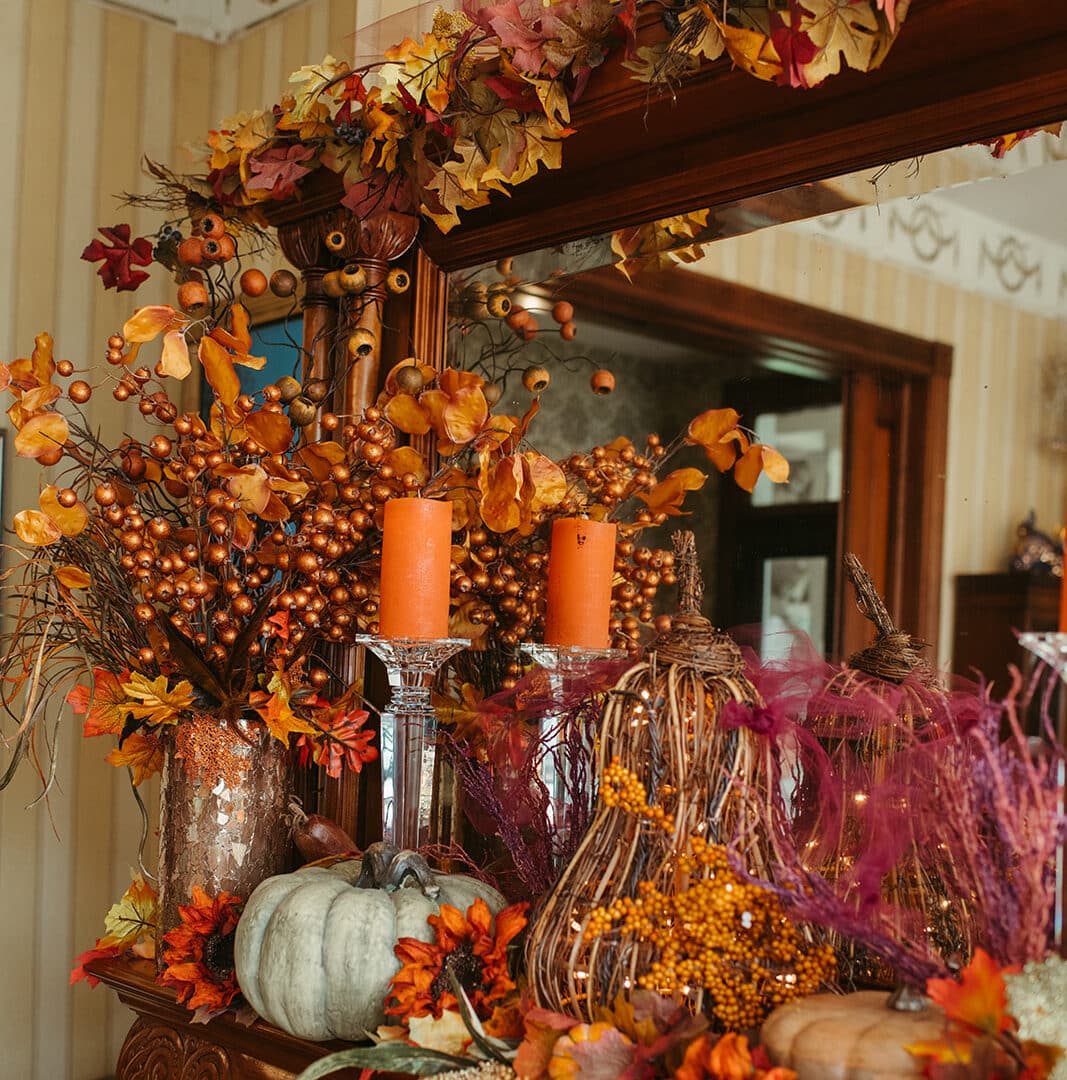 fireplace featuring Thanksgiving decor.